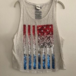 Sequined American flag muscle tee.